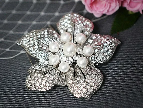 PHOEBE £41.70, art deco blooming flower vintage-inspired bridal hair comb with swarovski pearls. 